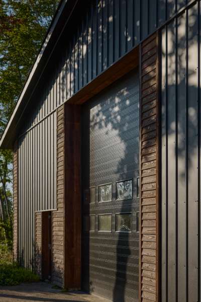 Summer light settles over steel profiles in the forest, Klæstruplundvej 11, 9240 Nibe, Denmark